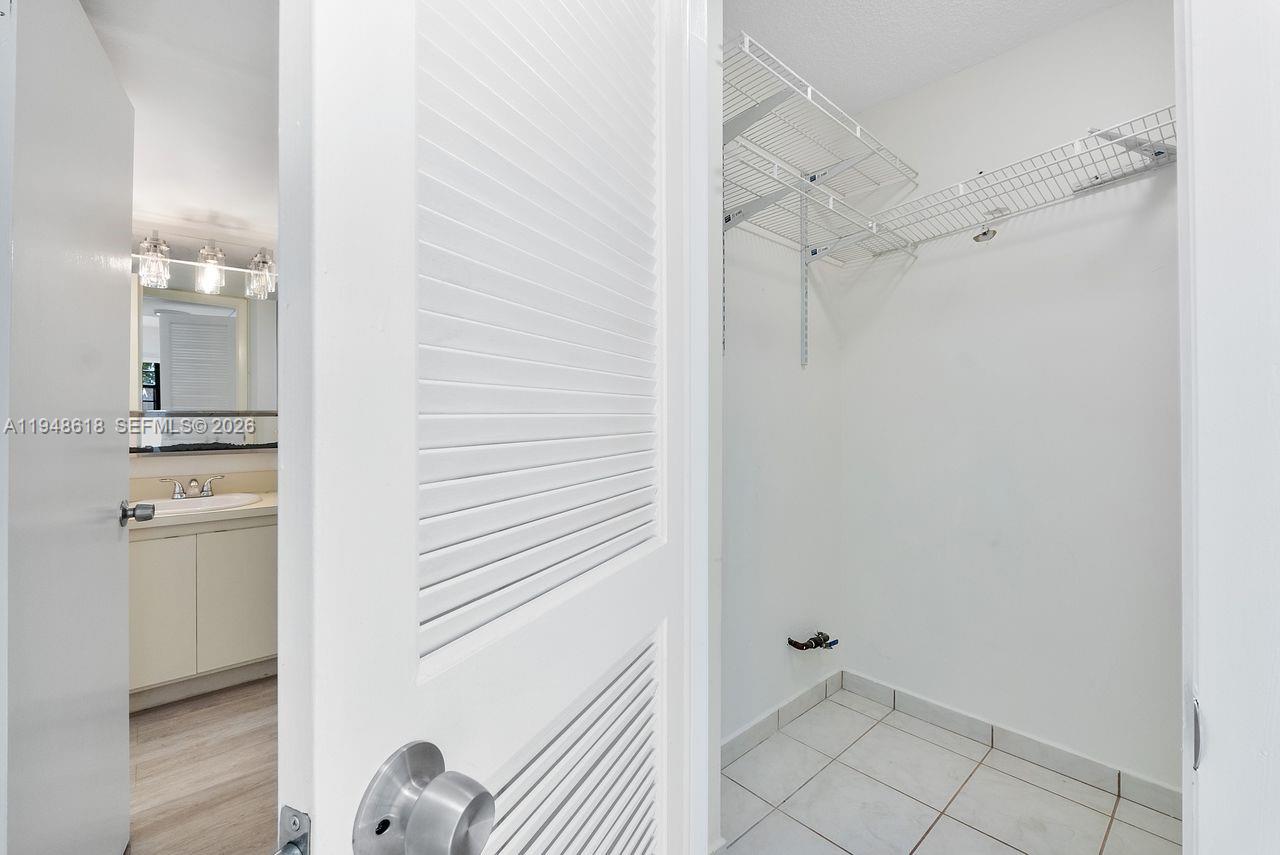995 Southwest 84th Avenue, Unit 223 Miami, FL 33144 - Photo 11 of 25 a bathroom with a shower