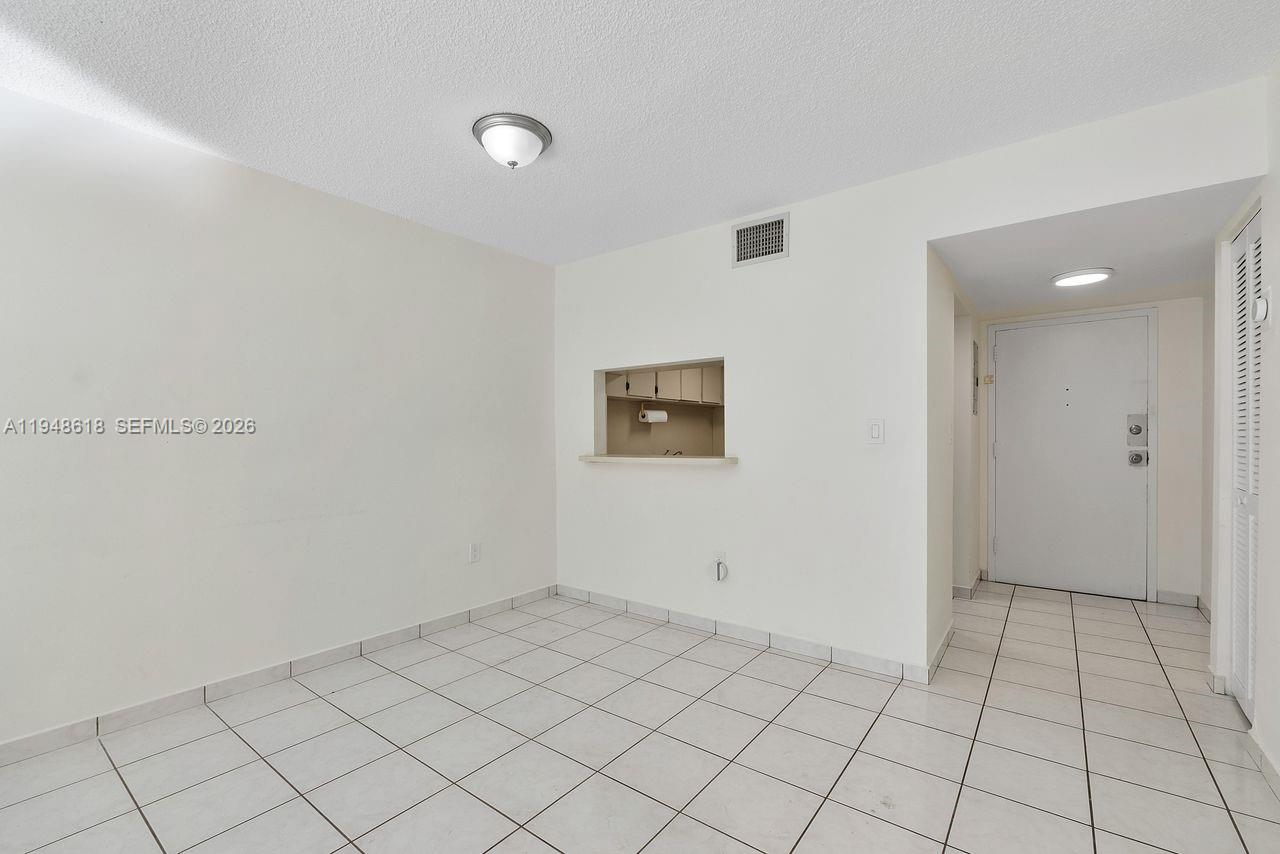 995 Southwest 84th Avenue, Unit 223 Miami, FL 33144 - Photo 17 of 25 a view of an empty room