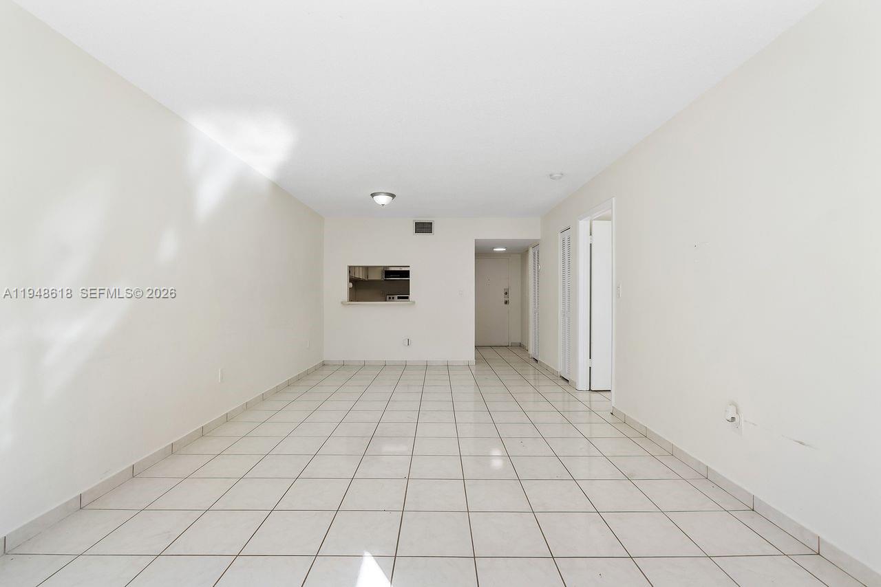 995 Southwest 84th Avenue, Unit 223 Miami, FL 33144 - Photo 20 of 25 a view of an empty room