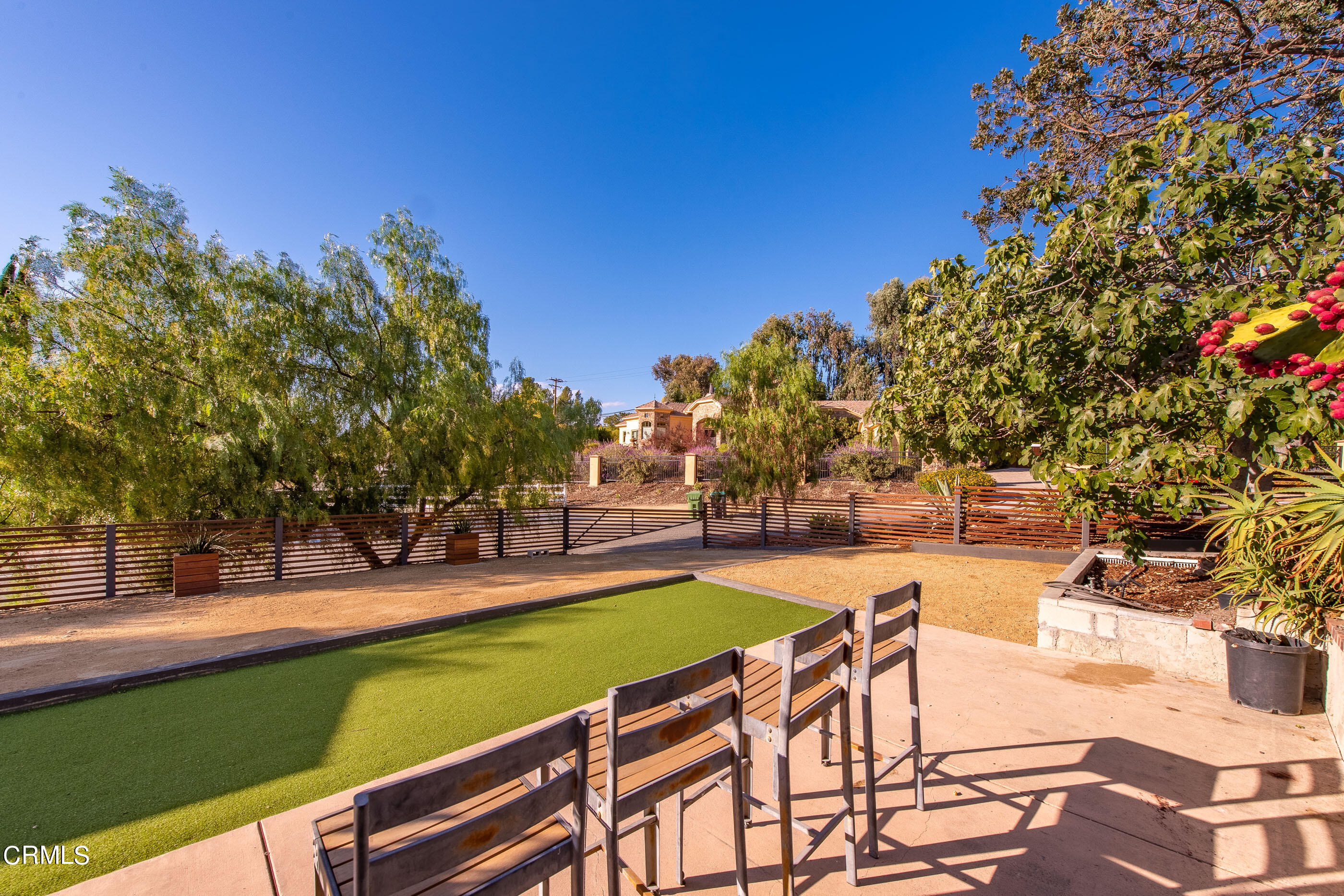 1644 Hauser Circle Thousand Oaks, CA 91362 - Photo 38 of 53 a view of a swimming pool with lawn chairs under an umbrella