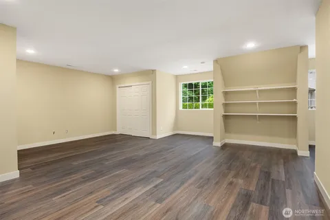 a bathroom with a shower and a toilet