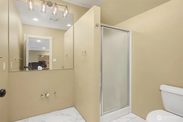 a kitchen with granite countertop a stove and a sink