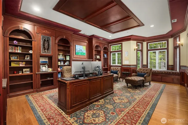 a living room with furniture rug and window
