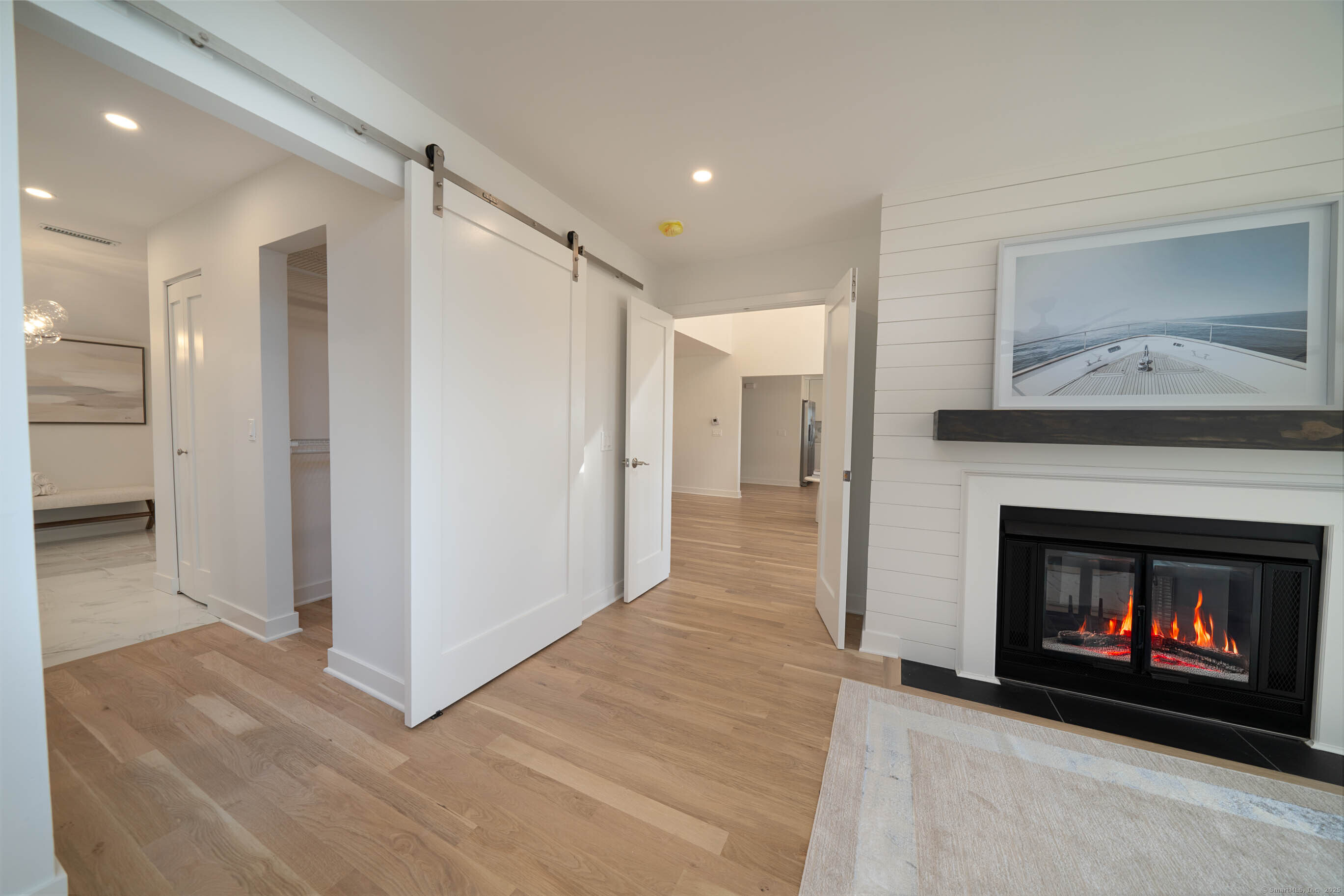 74 Quarry Dock Road, Unit 74 Branford, CT 06405 - Photo 27 of 37 a view of a livingroom with a fireplace and a fireplace