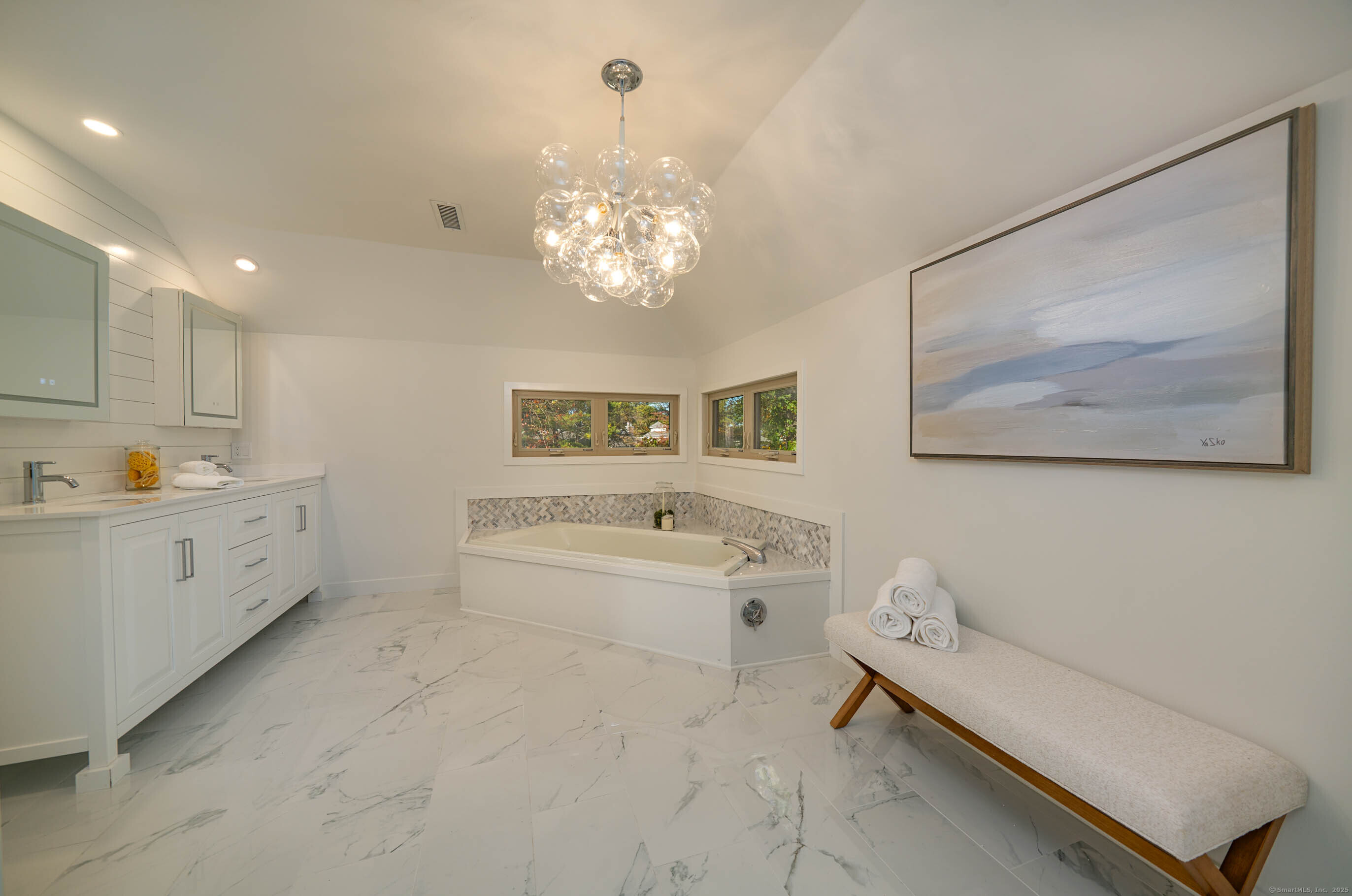 74 Quarry Dock Road, Unit 74 Branford, CT 06405 - Photo 28 of 37 a large white room with a double vanity sink and a window