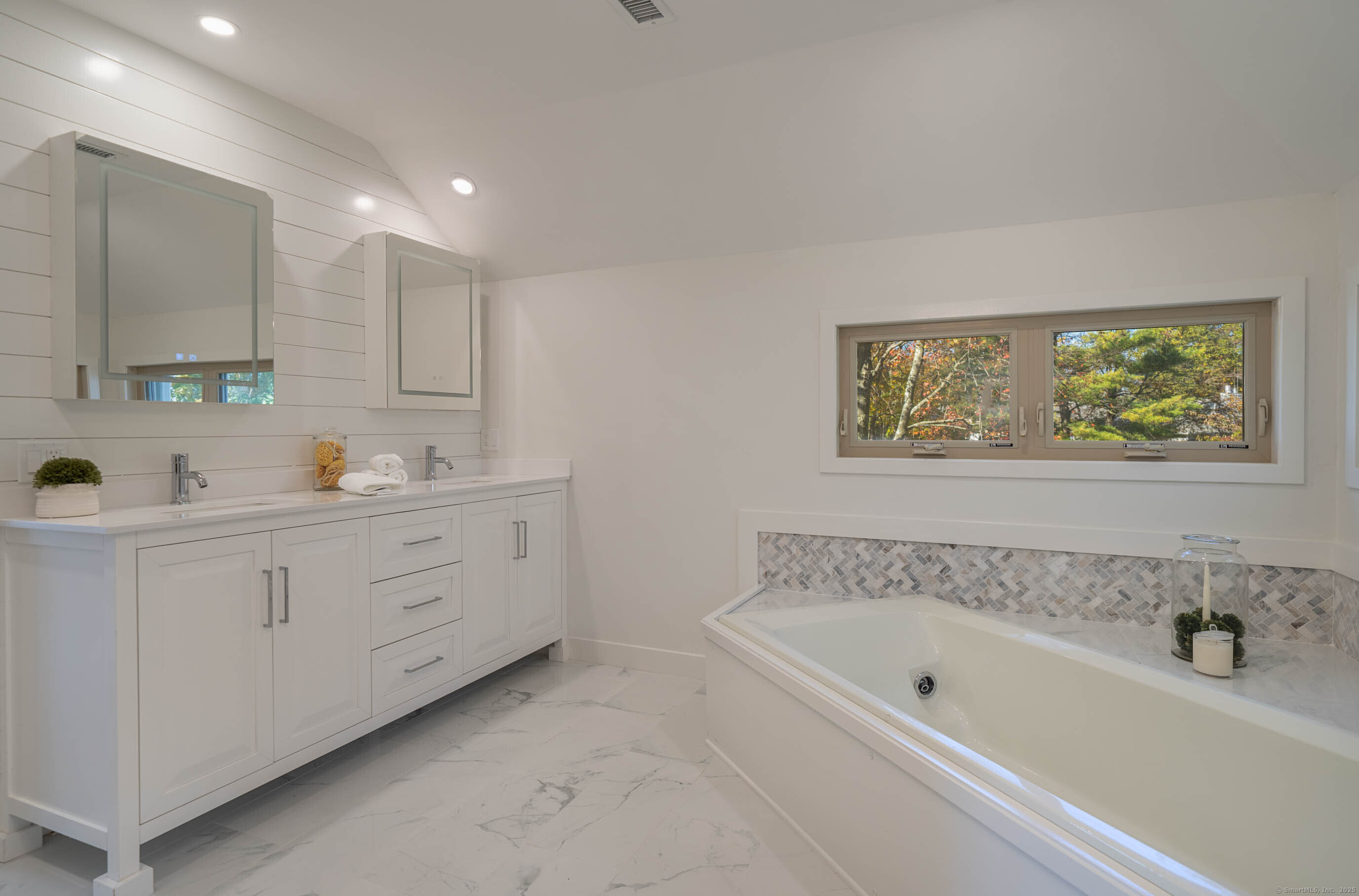 74 Quarry Dock Road, Unit 74 Branford, CT 06405 - Photo 30 of 37 a spacious bathroom with a tub sink and a window