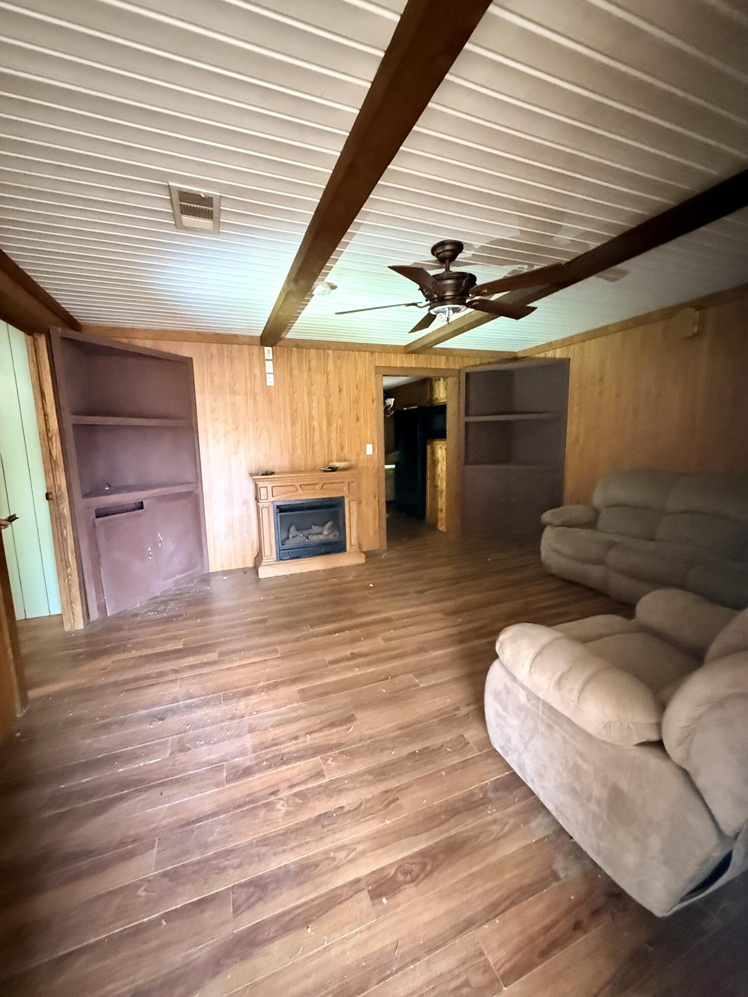 2483 Jordan Road Flomaton, AL 36441 - Photo 11 of 28 a living room with furniture and wooden floor
