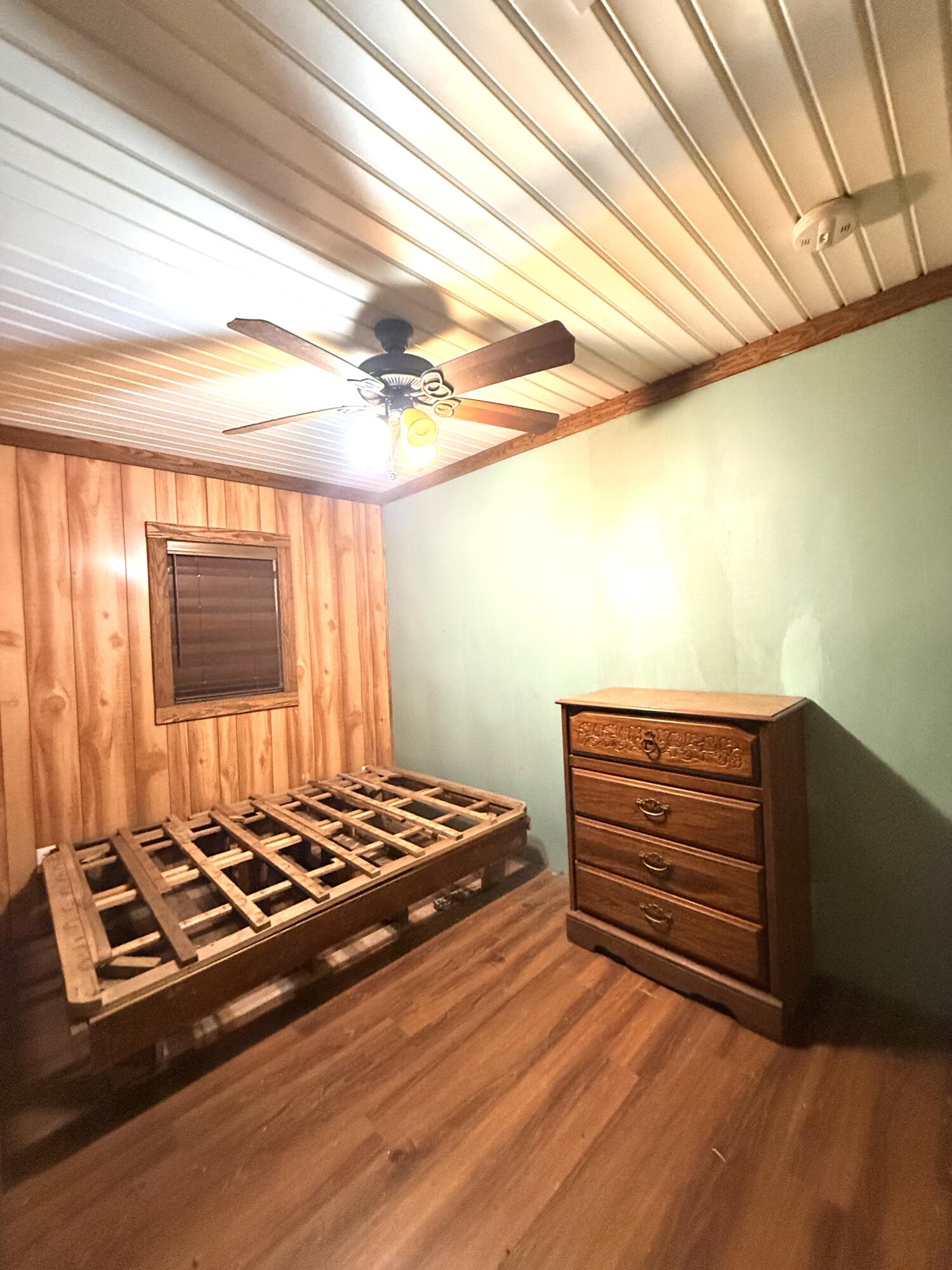 2483 Jordan Road Flomaton, AL 36441 - Photo 13 of 28 a bedroom with a bed and a window