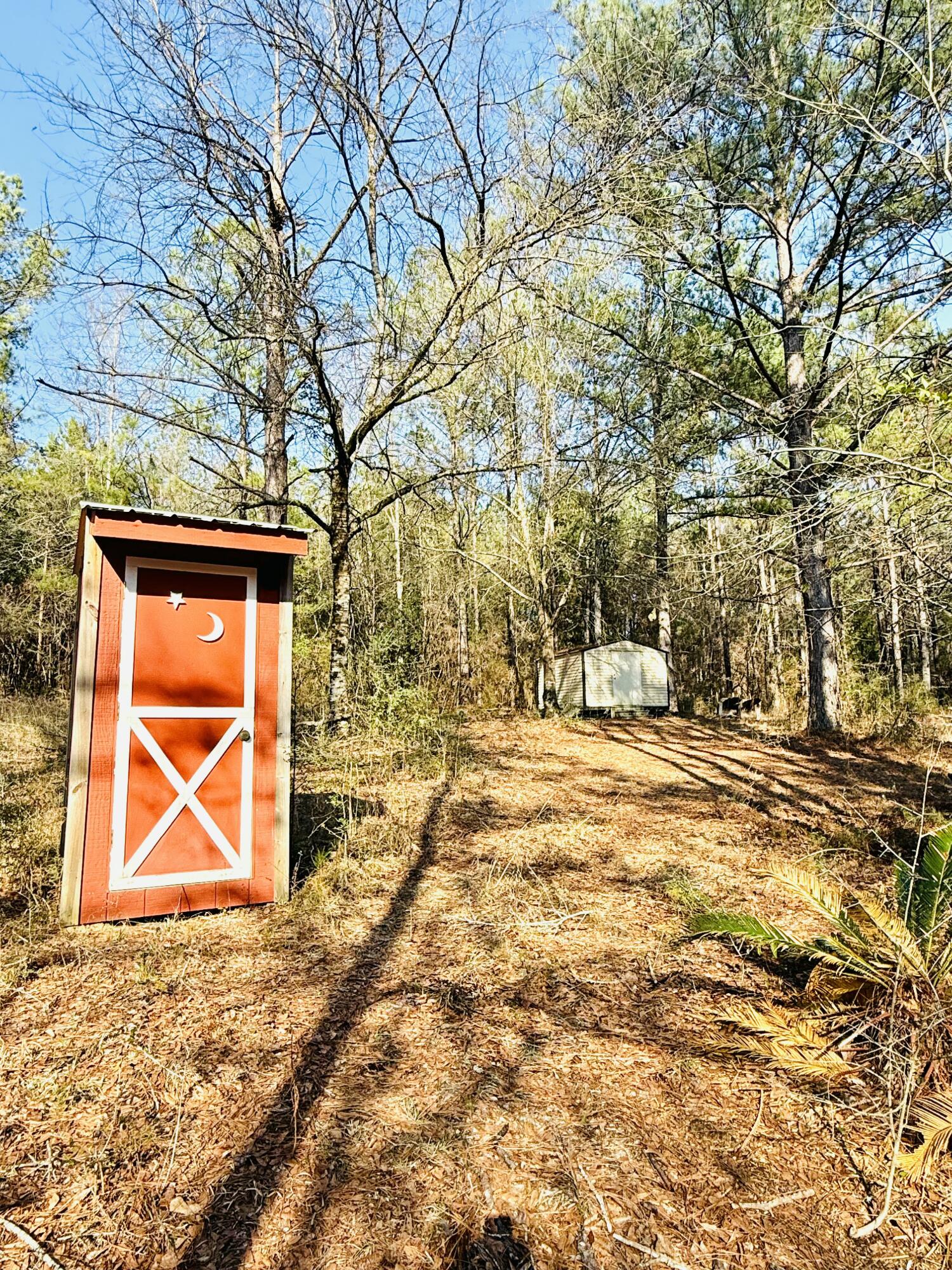 2483 Jordan Road Flomaton, AL 36441 - Photo 26 of 28 a view of a house with snow on the wall