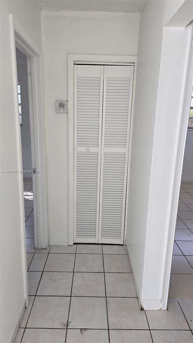 28152 Southwest 153rd Avenue, Unit 28152 Homestead, FL 33033 - Photo 8 of 12 a view of a hallway