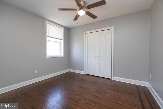 512 Jessamine Avenue Oaklyn, NJ 08107 - Photo 13 of 25 an empty room with wooden floor closet and windows