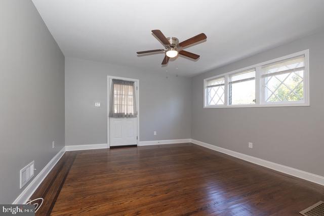 512 Jessamine Avenue Oaklyn, NJ 08107 - Photo 6 of 25 a view of empty room with wooden floor and fan