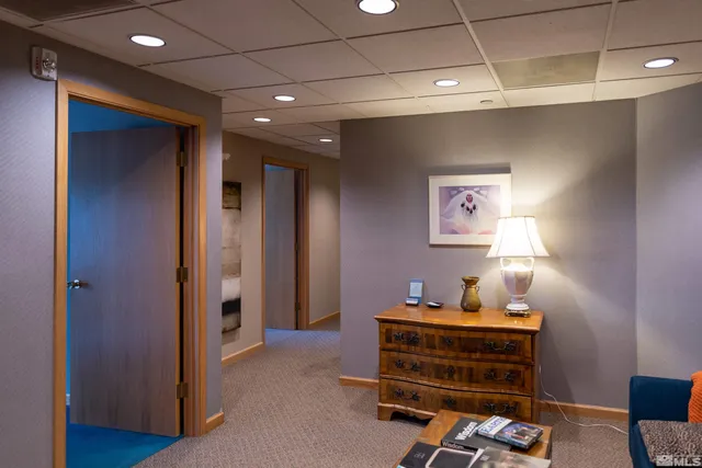 a room with furniture and wooden floor