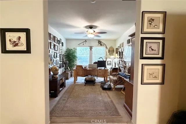 a spacious bathroom with a mirror a toilet and a shower