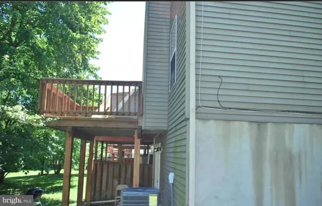 a couple of table and chair sitting in balcony