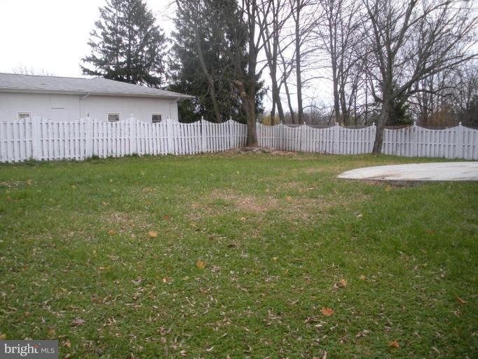 7012 Glen Spring Road Windsor Mill, MD 21244 - Photo 14 of 15 a view of yard with trampoline