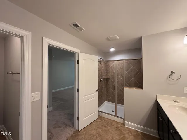 a view of a hallway with entryway