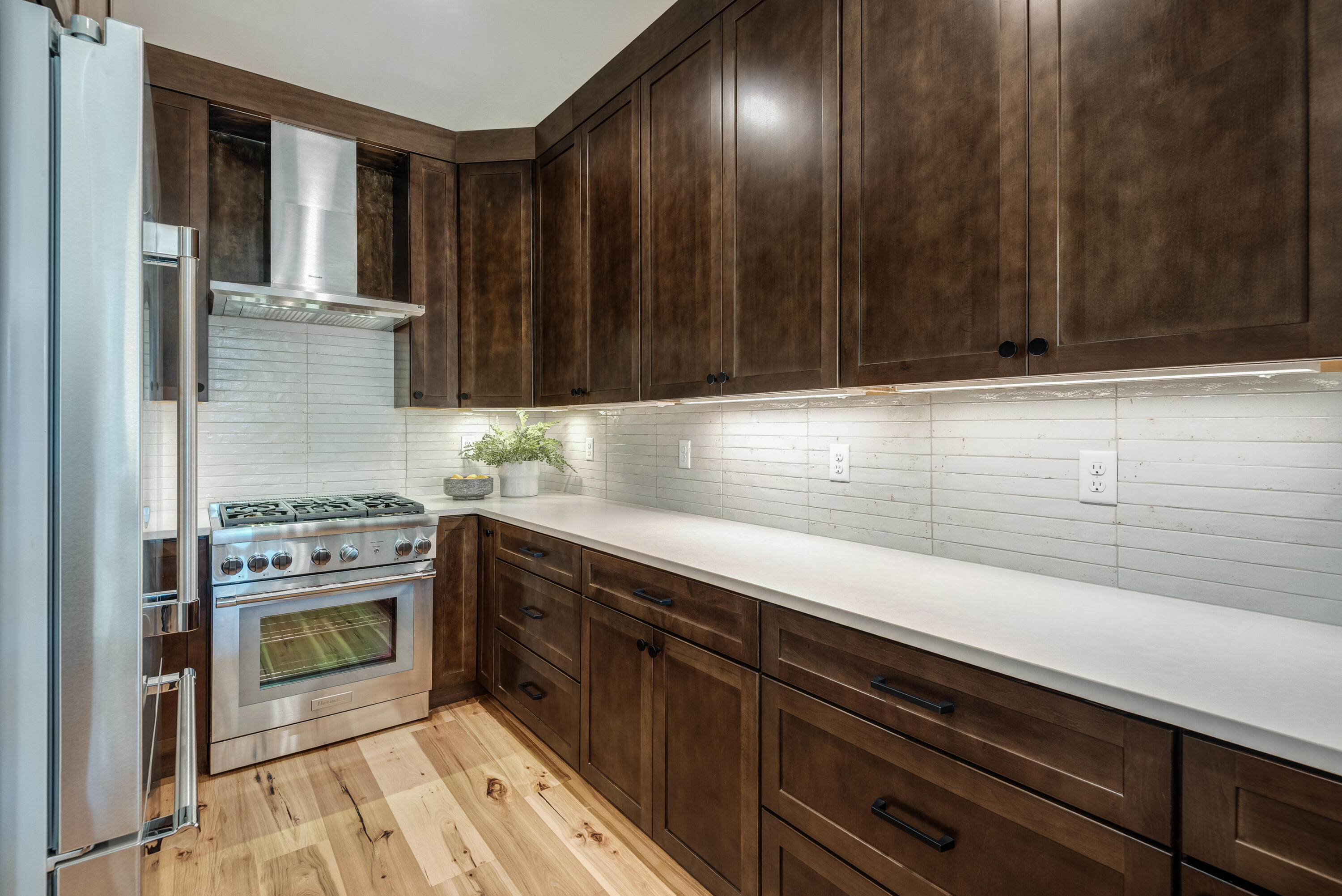 334 Southwest Roosevelt Avenue, Unit 4 Bend, OR 97702 - Photo 10 of 22 a kitchen with a stove and a sink