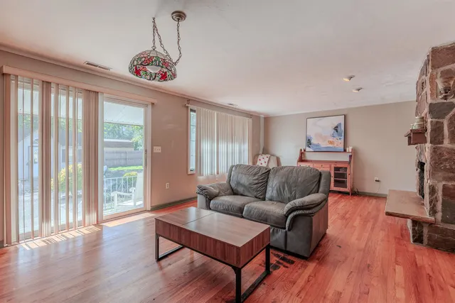 a kitchen with a sink a counter top space and cabinets