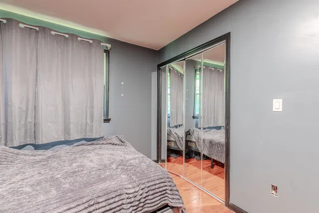 a kitchen with a refrigerator and window