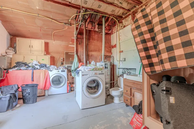 a storage and utility room with a lot of stuff