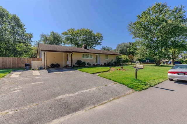 a view of a house with a big yard