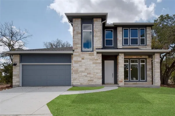 a brick house with a large windows