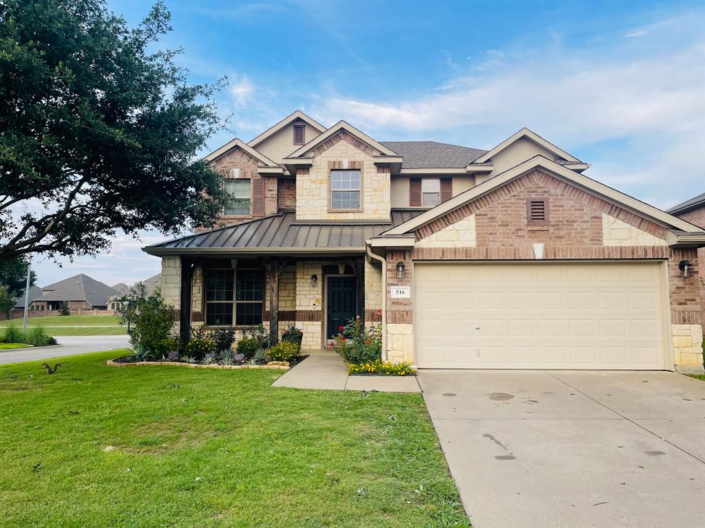 516 Angela Lane Euless, TX 76039 - Photo 1 of 39 Craftsman inspired home with a standing seam roof, a metal roof, concrete driveway, and an attached garage