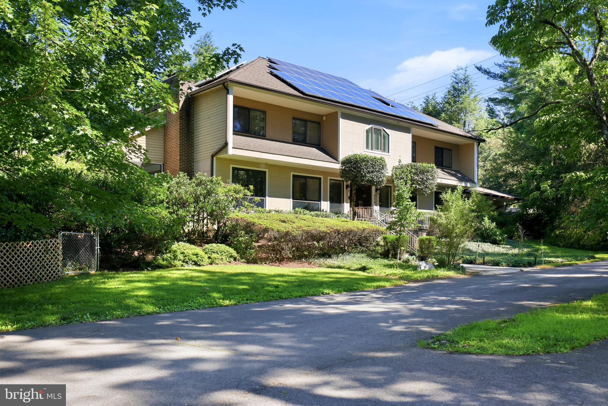 Elegant Estate on Private wooded setting
