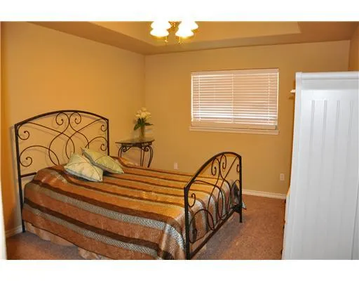 a view of a bedroom with a window