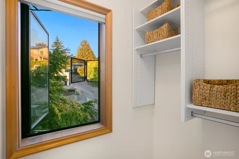 a bathroom with a sink toilet and mirror