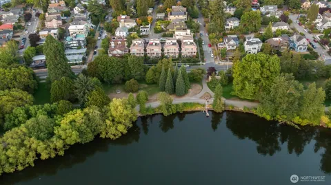 a balcony with table and chairs