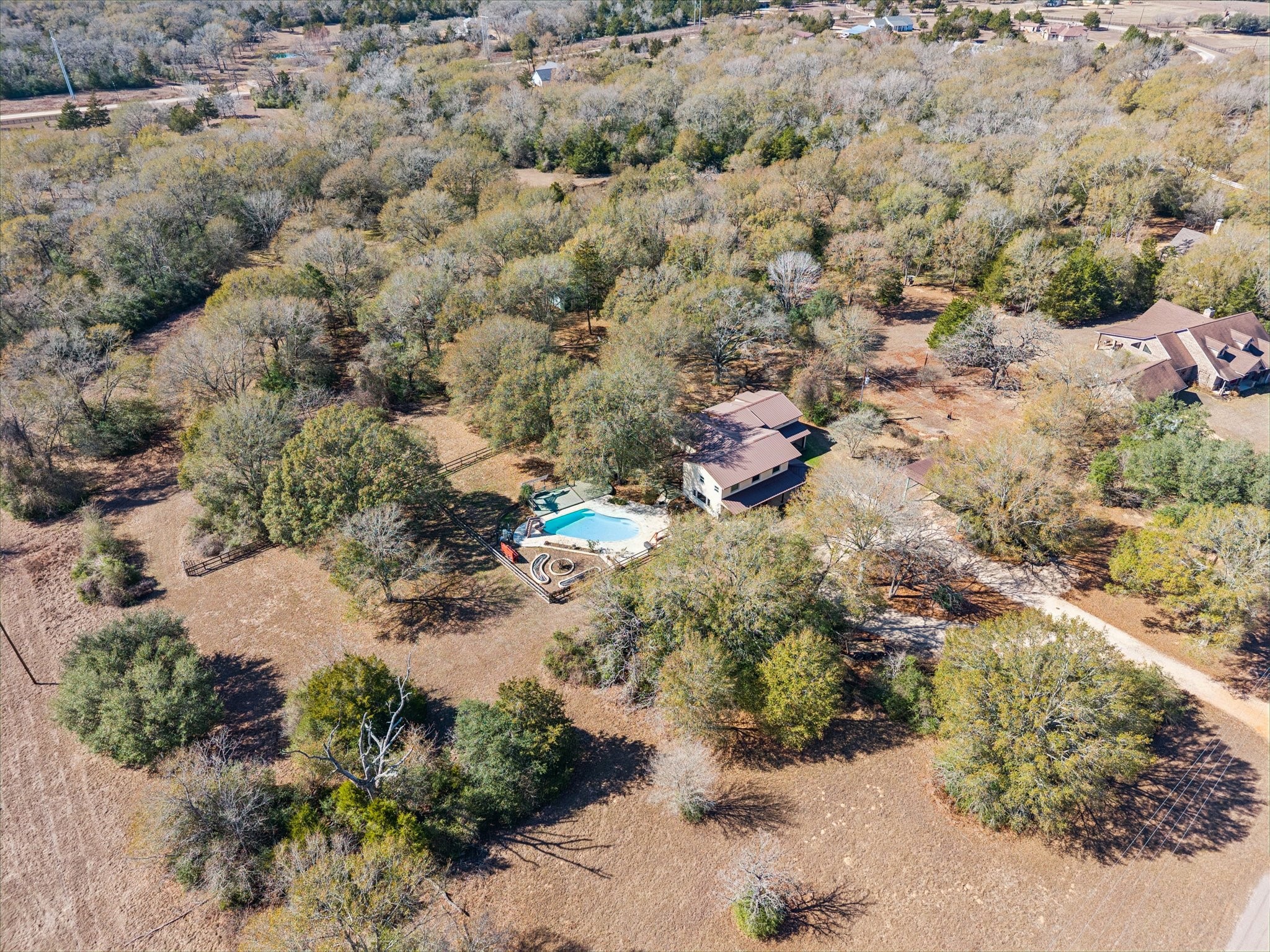 640 Piney Creek Road Bellville, TX 77418 - Photo 32 of 35 a view of a forest with a forest