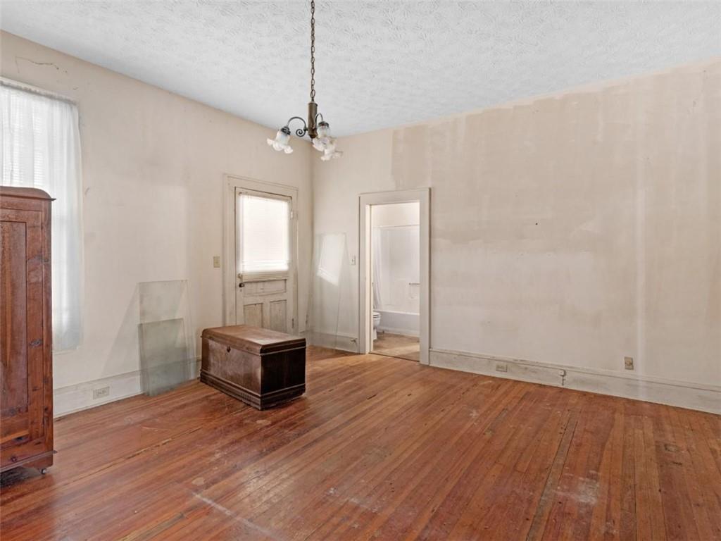 481 Turner Road Concord, GA 30206 - Photo 27 of 44 a view of an empty room with wooden floor and a window