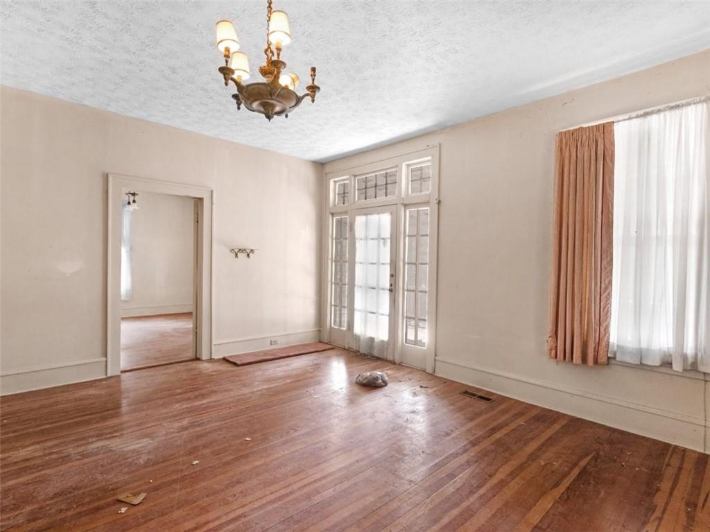 481 Turner Road Concord, GA 30206 - Photo 33 of 44 a view of an empty room with wooden floor and a window