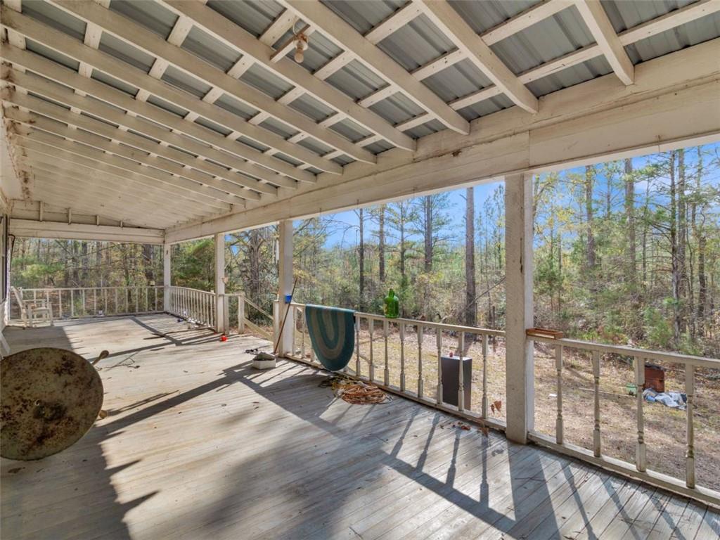 481 Turner Road Concord, GA 30206 - Photo 34 of 44 a view of a living room and balcony with furniture