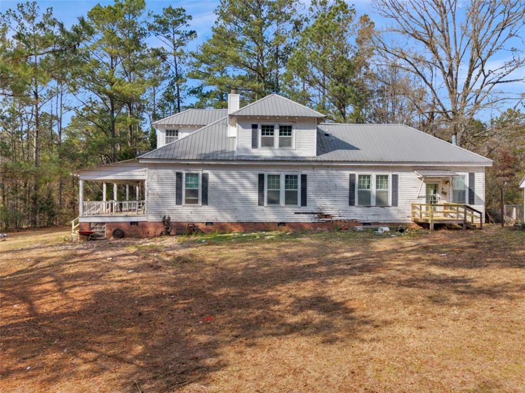 481 Turner Road Concord, GA 30206 - Photo 35 of 44 a front view of a house with a garden