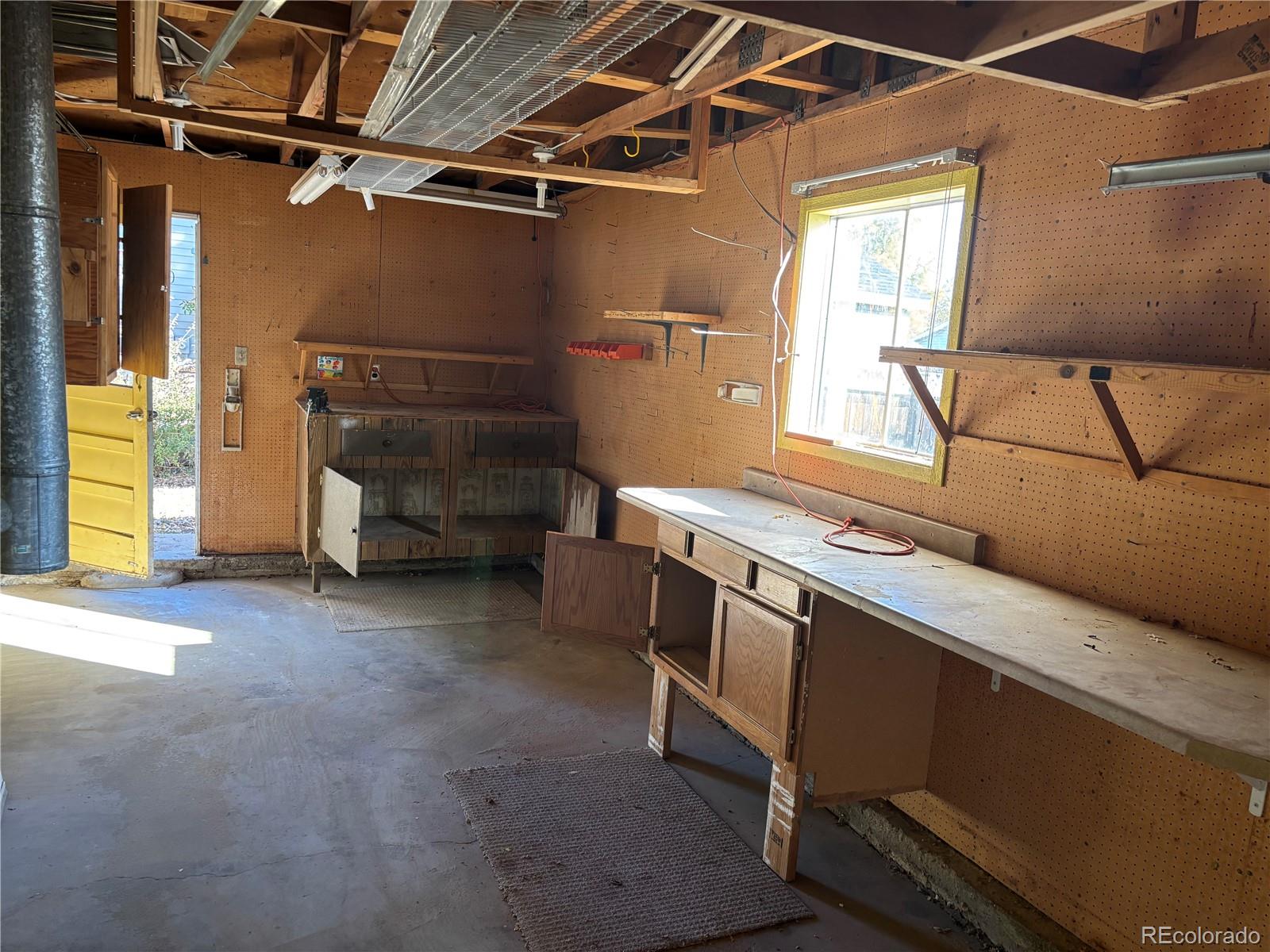 9162 Cody Street Broomfield, CO 80021 - Photo 22 of 29 a view of storage and utility room
