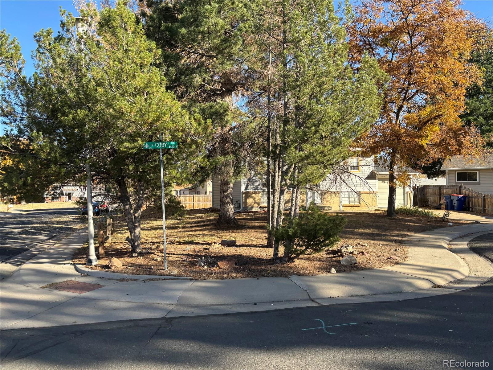 9162 Cody Street Broomfield, CO 80021 - Photo 29 of 29 a view of yard with tree s
