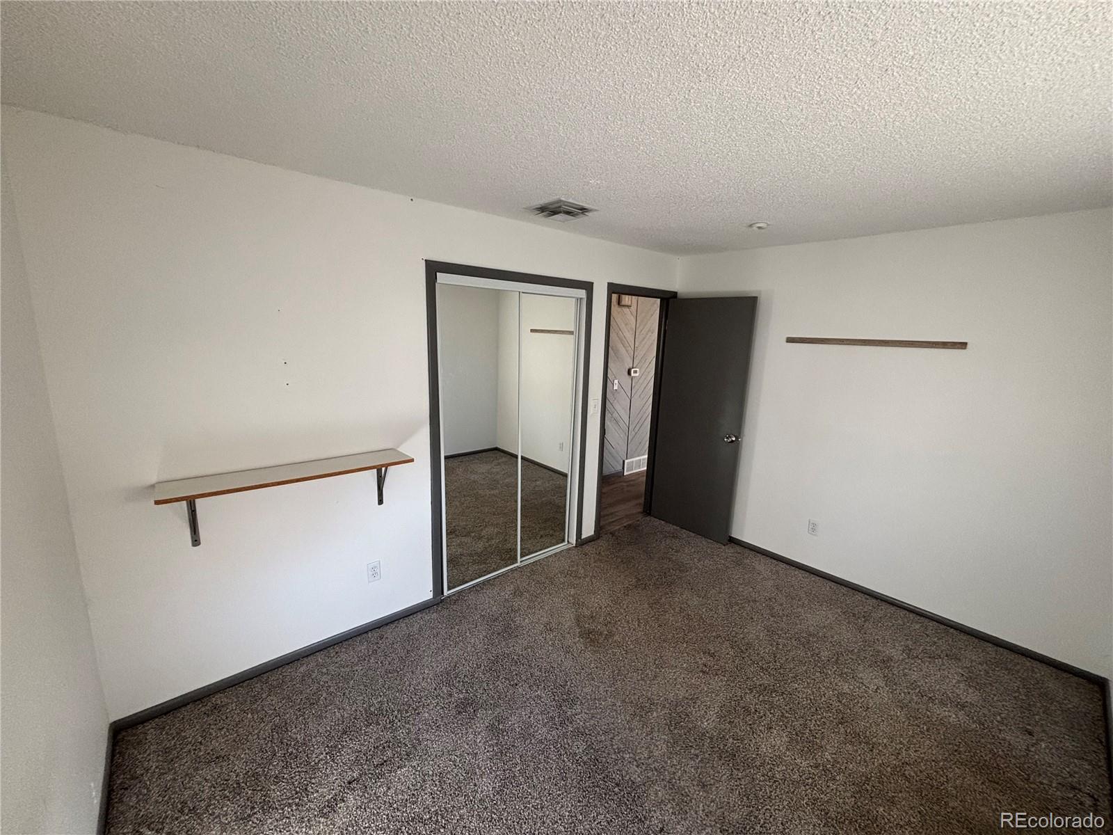 9162 Cody Street Broomfield, CO 80021 - Photo 9 of 29 a view of empty room