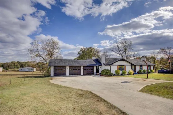 a view of a park with swings and slides