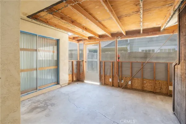a view of a room with wooden walls