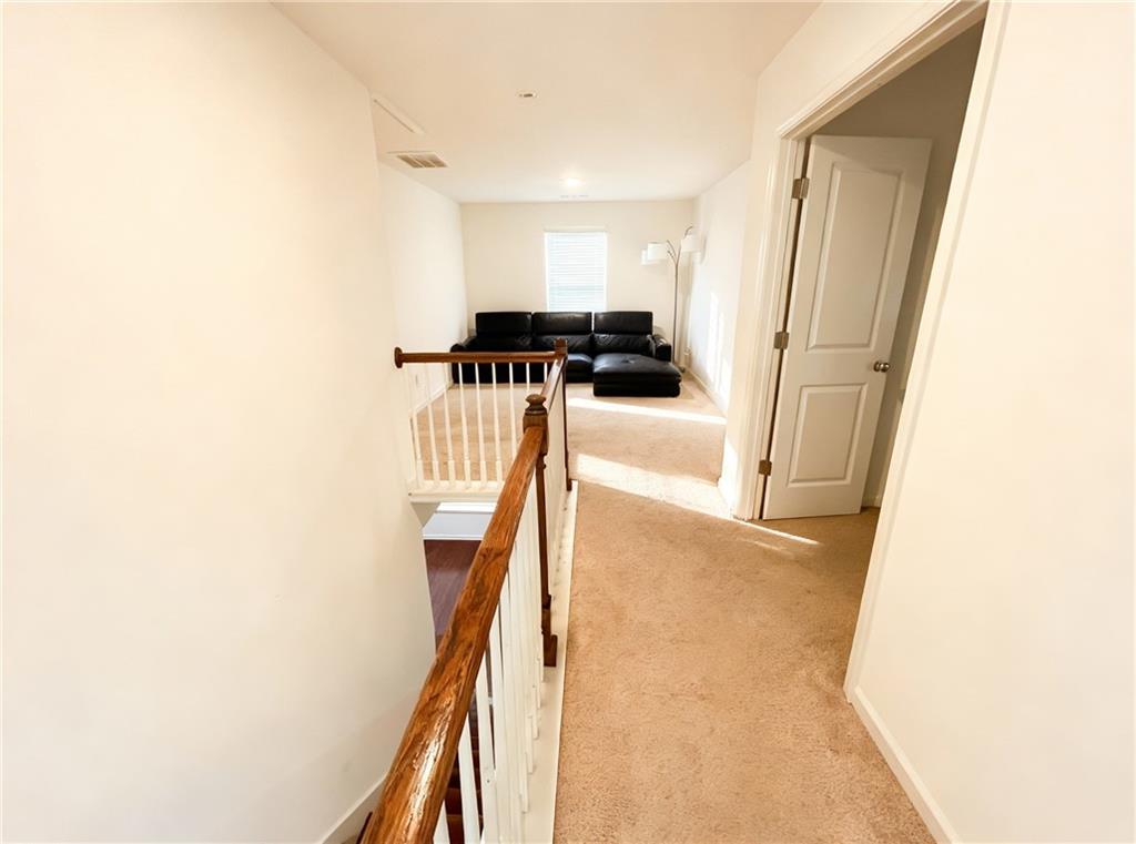 602 Lofty Lane Atlanta, GA 30331 - Photo 13 of 38 a view of a hallway with furniture and stairs