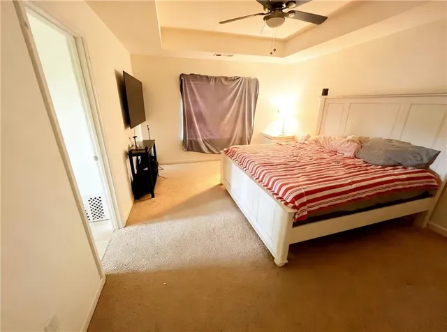 a kitchen with sink stove and refrigerator