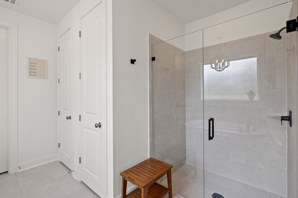 365 Pear Tree Lane Austin, TX 78737 - Photo 22 of 39 a view of a bathroom with a shower