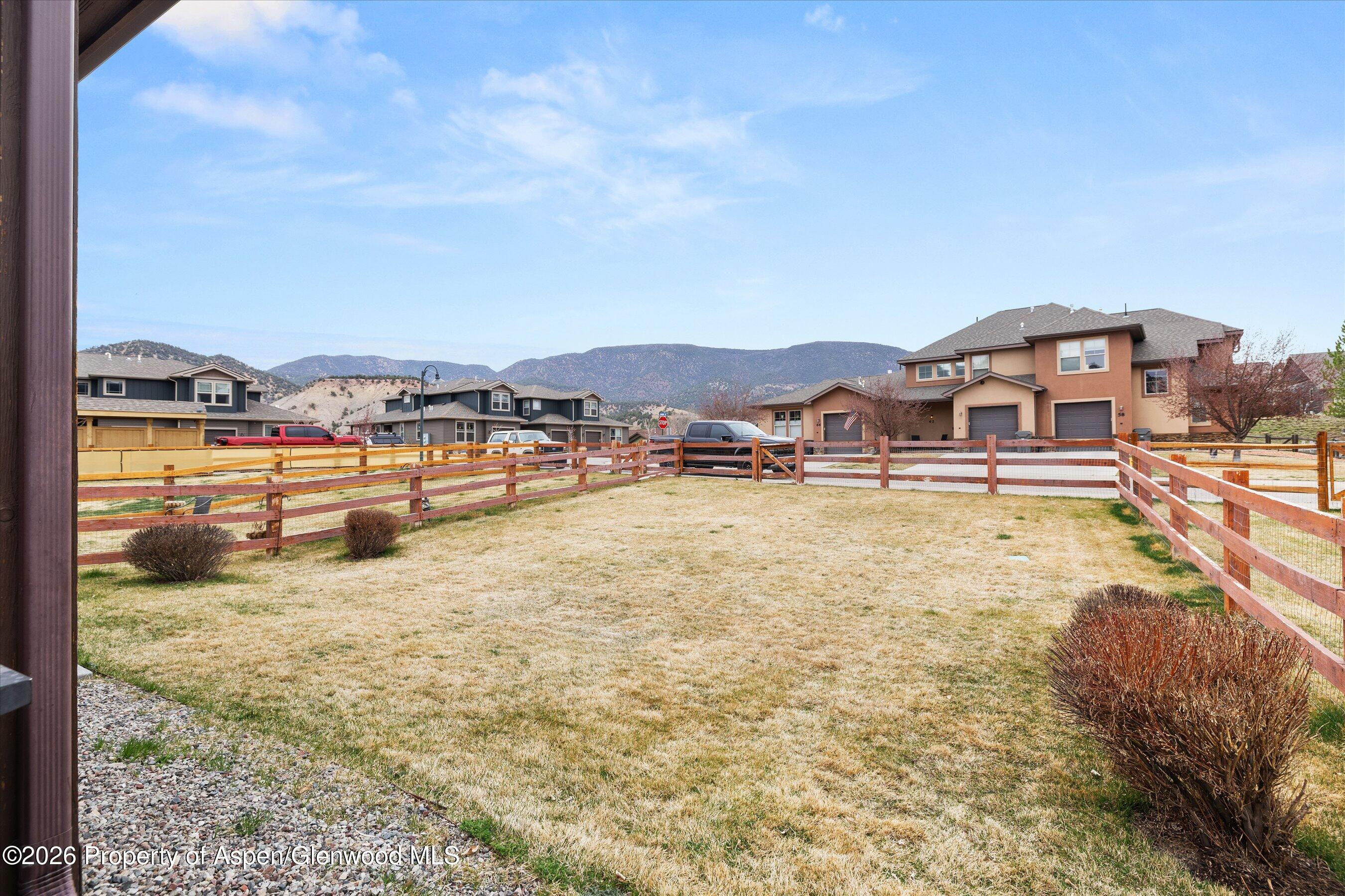 114 Redstone Drive New Castle, CO 81647 - Photo 16 of 20 a view of a lake with houses