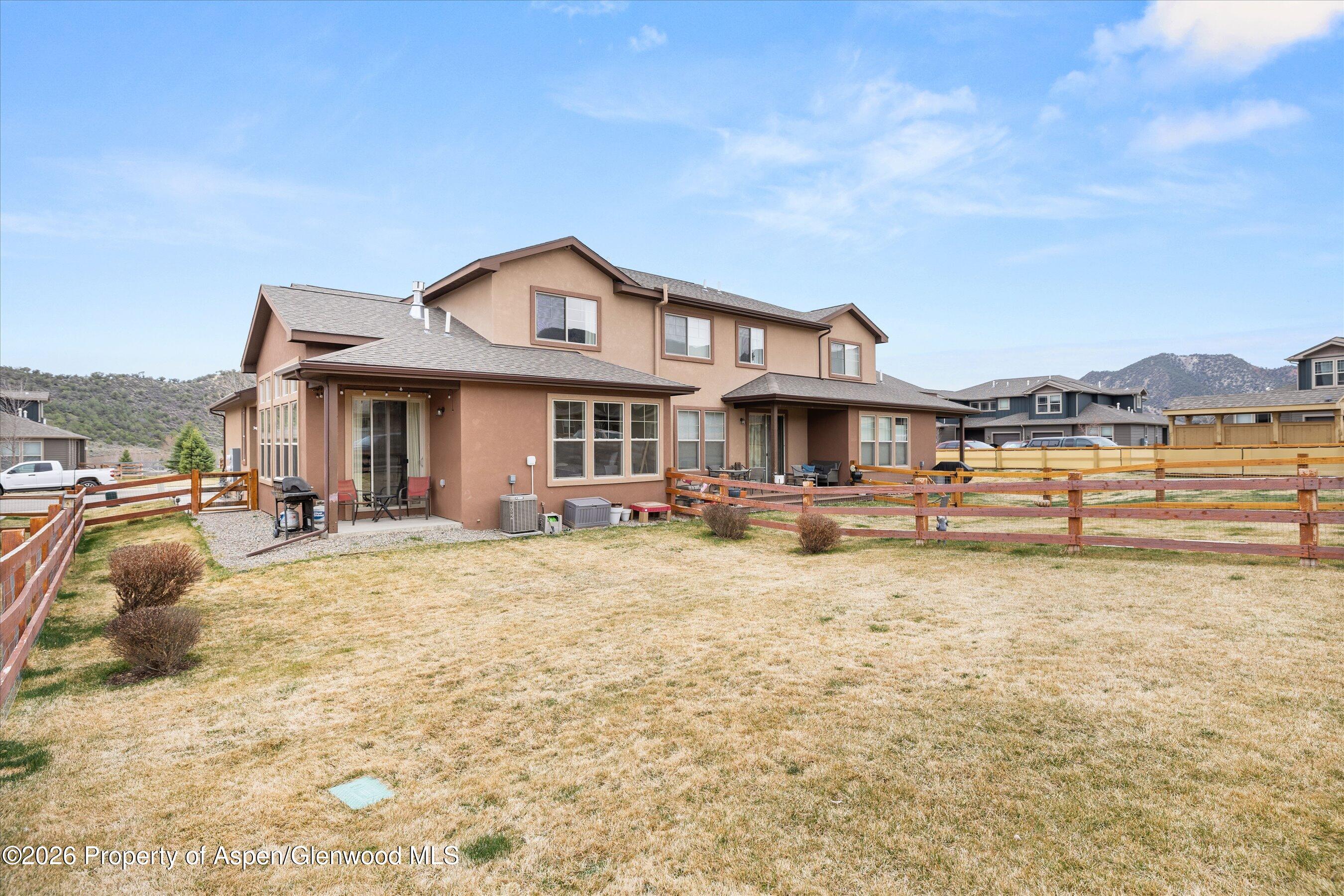 114 Redstone Drive New Castle, CO 81647 - Photo 18 of 20 a front view of a house with a yard