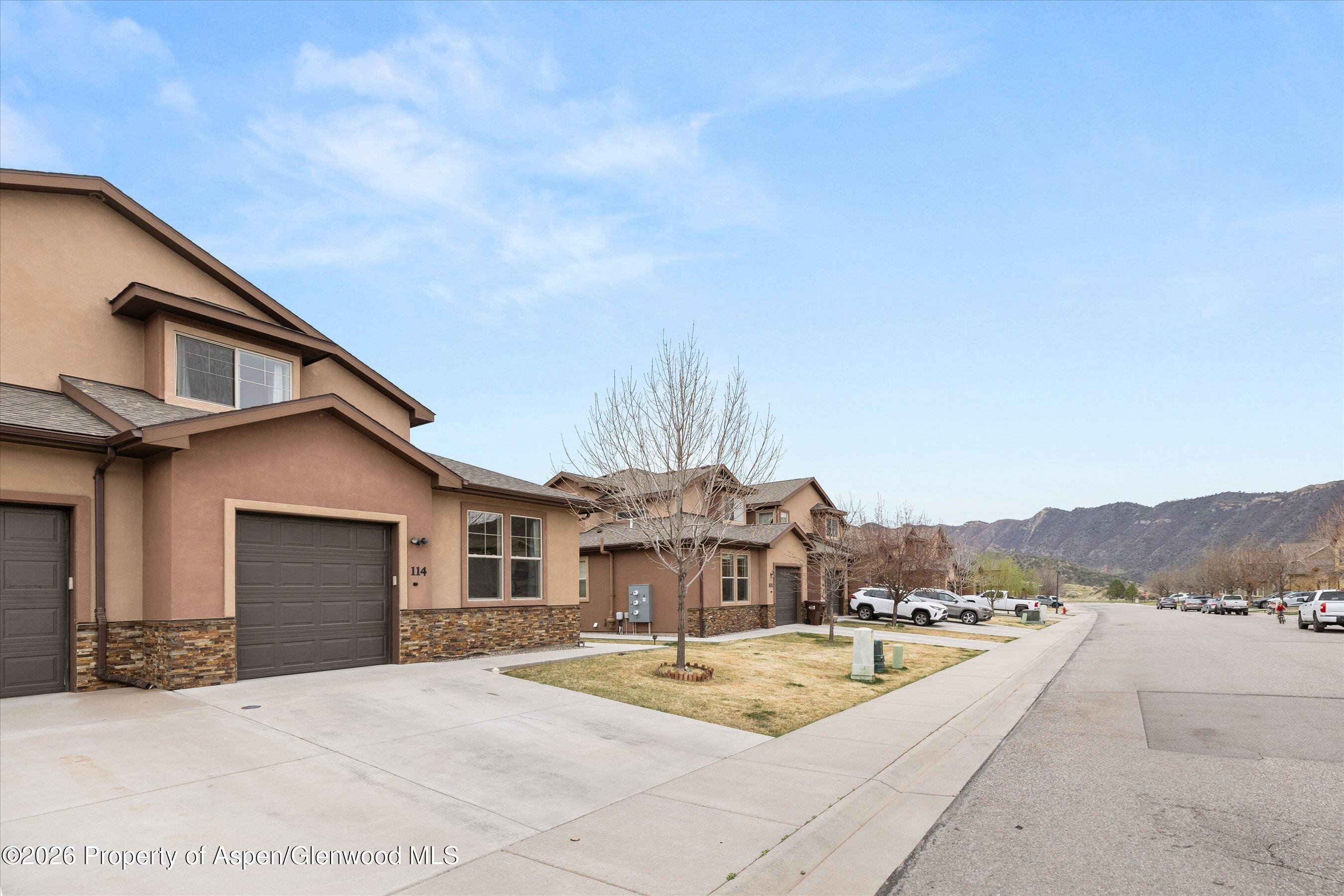 114 Redstone Drive New Castle, CO 81647 - Photo 20 of 20 a view of a house with pool and a yard