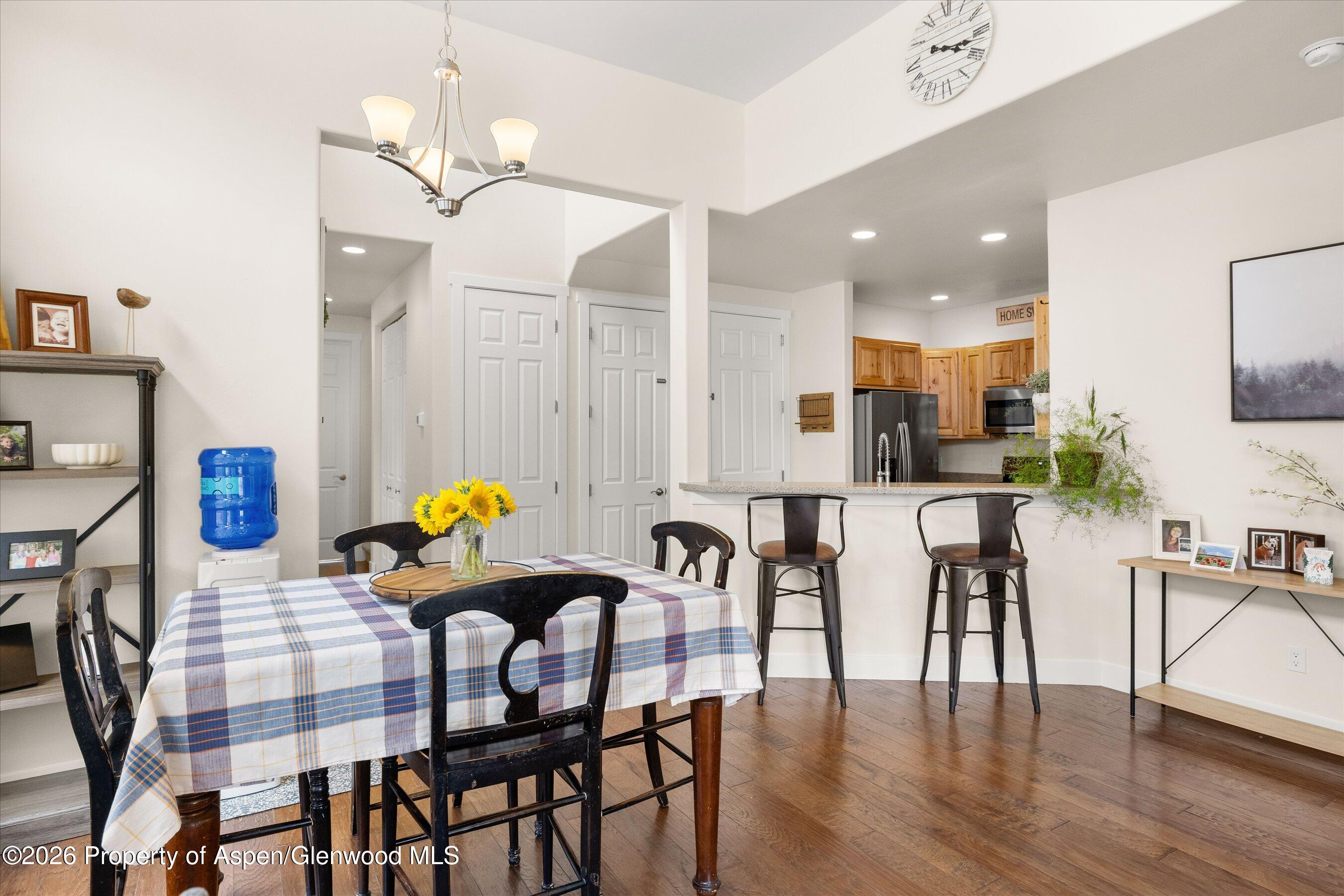 114 Redstone Drive New Castle, CO 81647 - Photo 5 of 20 a dining room with furniture and wooden floor