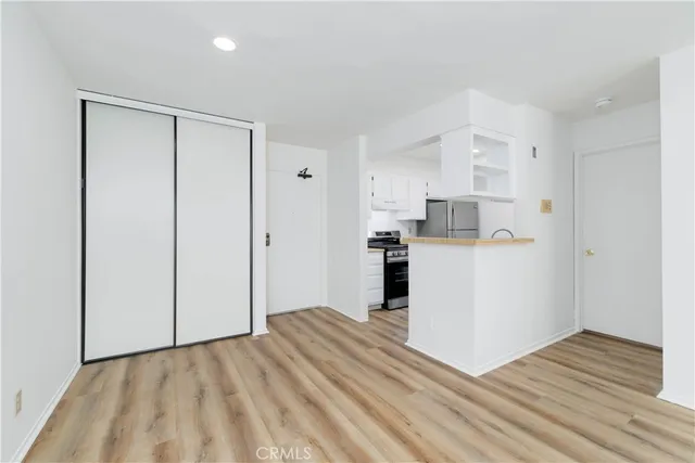 a view of kitchen with wooden floor